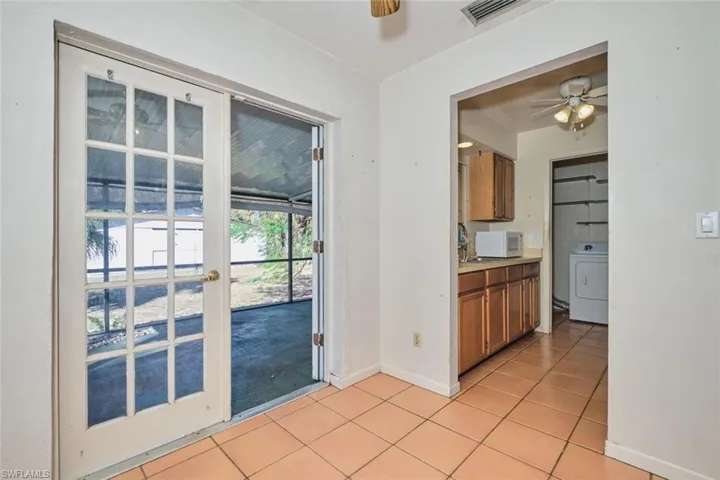 french doors to lanai, kitchen, laundry room