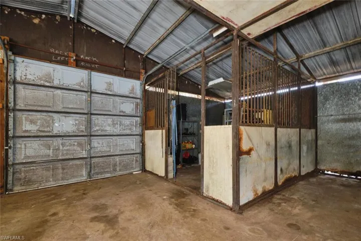 inside barn with garage door