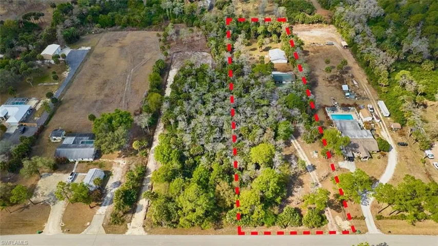 Aerial overview of property's location featuring approximate boundary lines