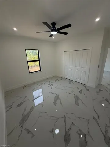White porcelain tile flooring with grey veining