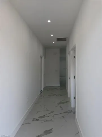 Beautiful walk way leading into kitchen