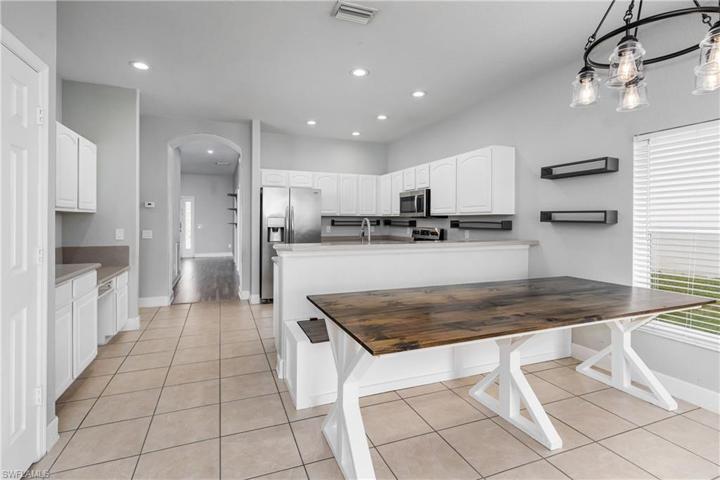 Opposite View into the Kitchen.  Custom Made kitchen table can remain, upon REQUEST.