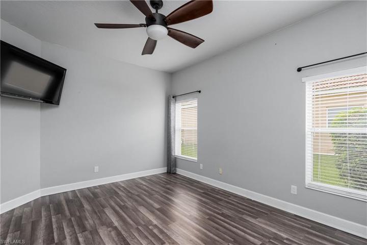 Primary Bedroom with TV, which remains.