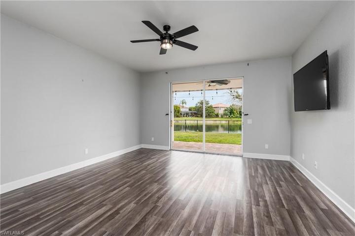 Great Room with TV which remains.
