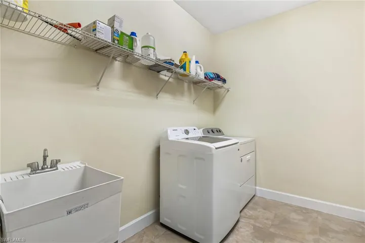 Laundry Room with Sink and Room for Additional Storage