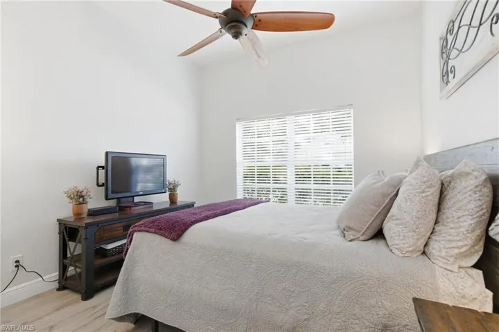 Bedroom featuring a ceiling fan and light wood finished floors