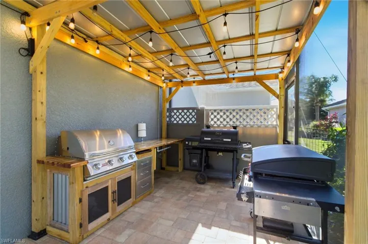 View of patio with area for grilling