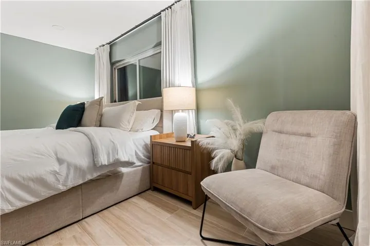Bedroom with wood finished floors