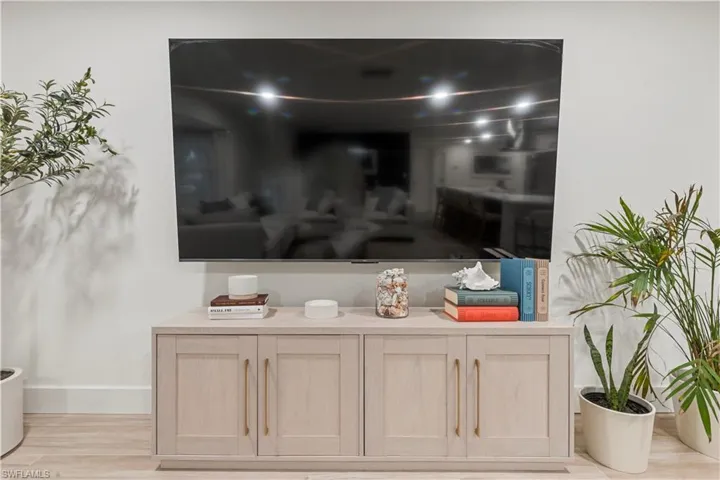 Detailed view of wood finished floors and baseboards