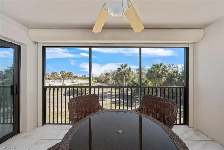 Screened balcony featuring expansive outdoor scenery