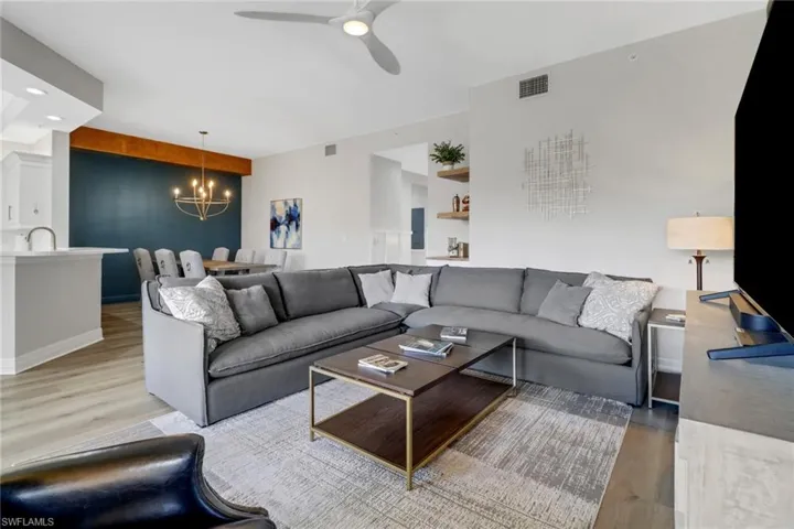 Living area with light wood-type flooring