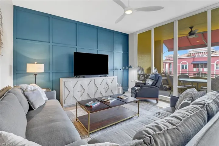 Living area featuring a decorative wall