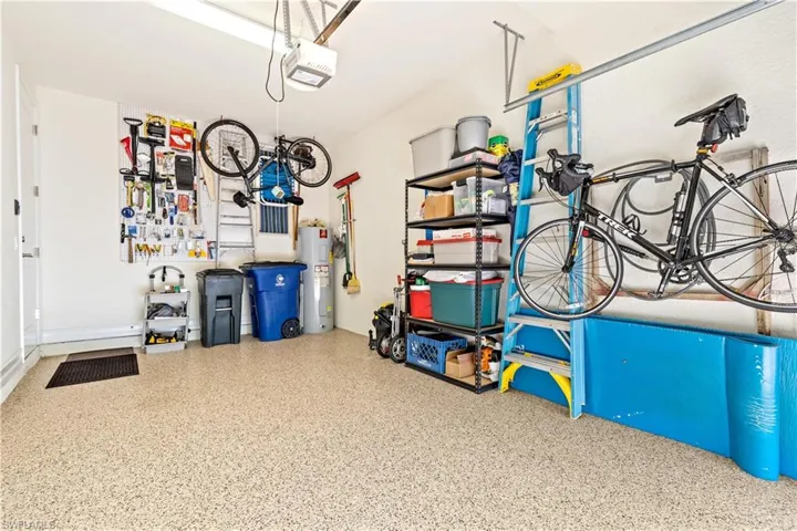 Garage featuring epoxy paint protected flooring