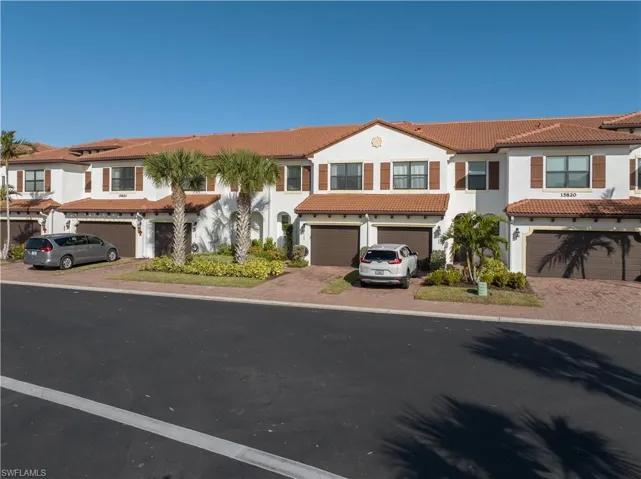 Mediterranean / spanish-style house featuring a garage