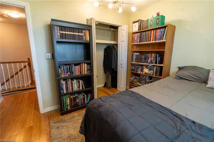 Guest bedroom with plenty of closet space.