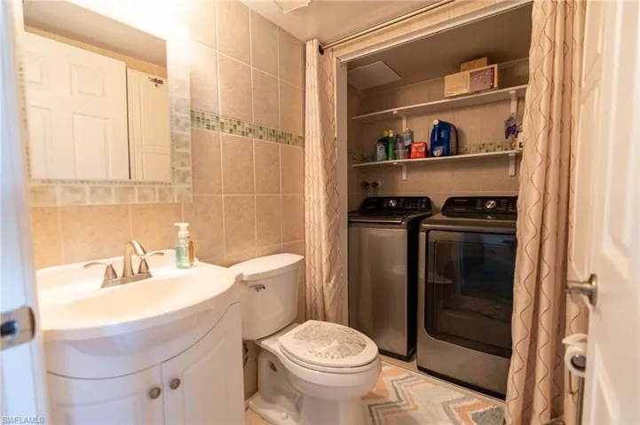 Updated half bath with designer tiles.
