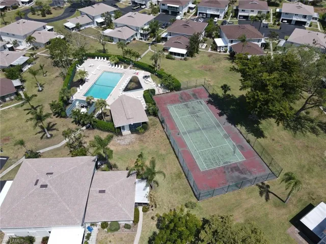 View of building and tennis court.