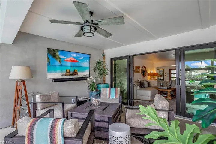 View of patio with ceiling fan