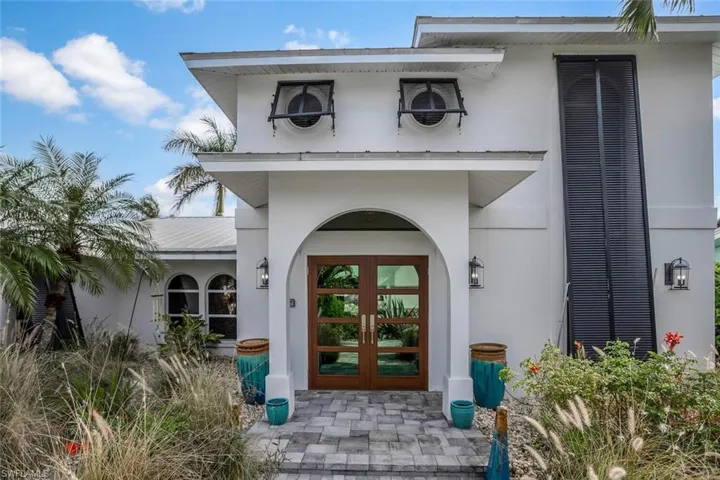 Entrance to property featuring french doors