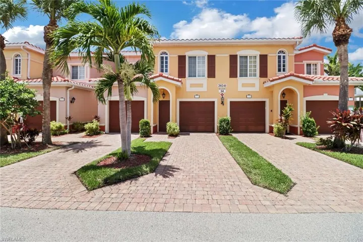 Mediterranean / spanish house featuring a garage