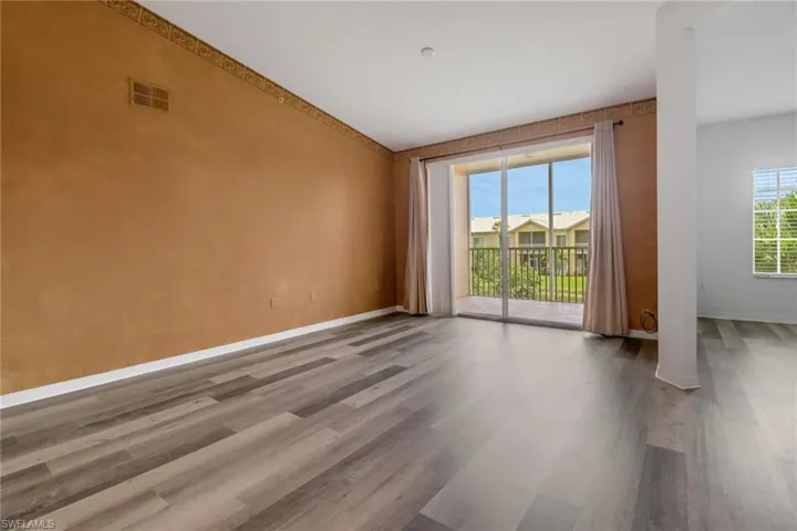 Unfurnished room with wood-type flooring