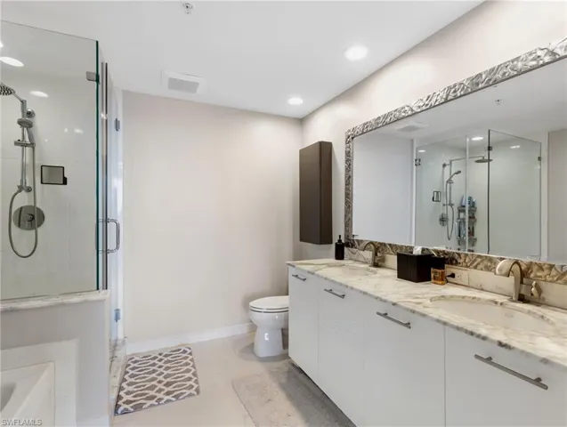 dual vanities, soaking tub, shower