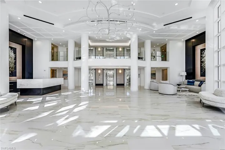 Common area with recessed lighting and a high ceiling