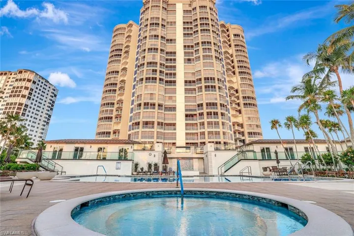 Community pool featuring a patio