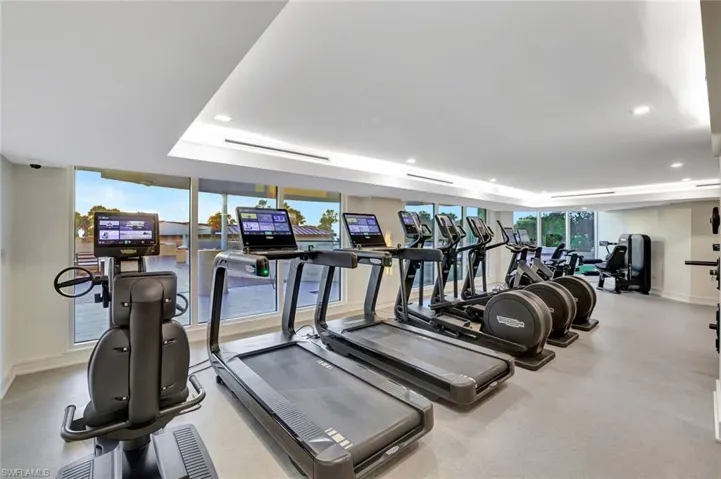 Exercise room featuring recessed lighting