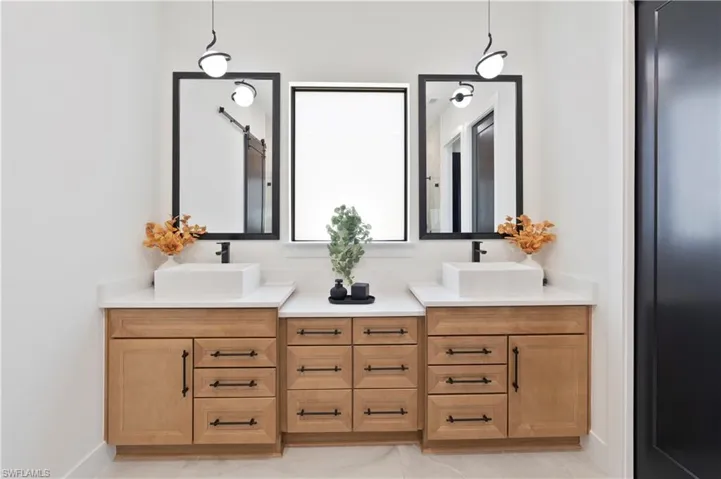 Full bathroom featuring double vanity