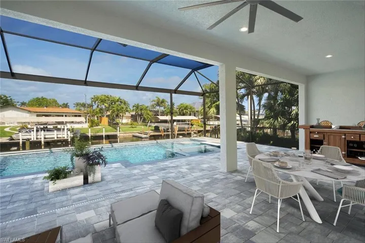Swimming pool with a patio area, a sunroom, a ceiling fan, and a lanai - Virtually Staged