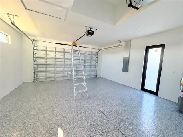 Garage featuring electric panel