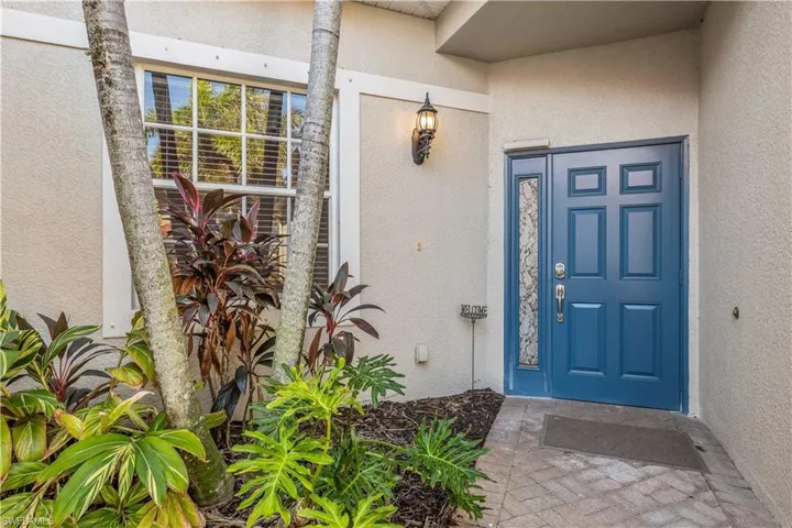 View of private entrance to property, freshly painted.