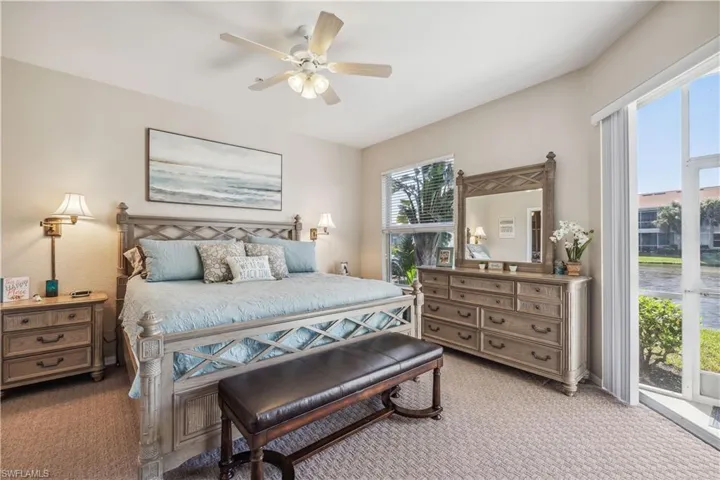 Main bedroom with a water view and a large walk-in closet.