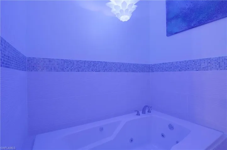 Bathroom with Jacuzzi and mood lighting