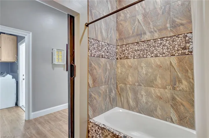 Bathroom with shower / tub combination