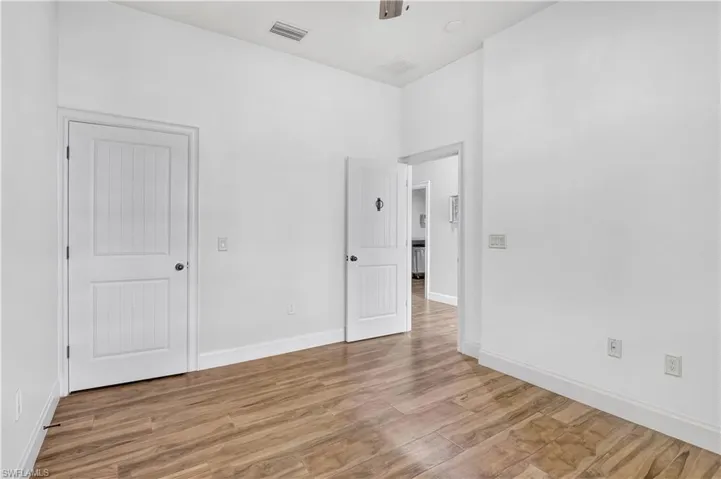 Bedroom with walk in closet