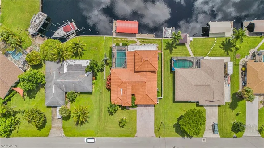 Aerial view of residential area with a large body of water