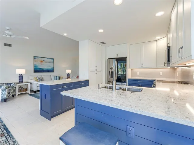 Custom pantry to left of refrigerator