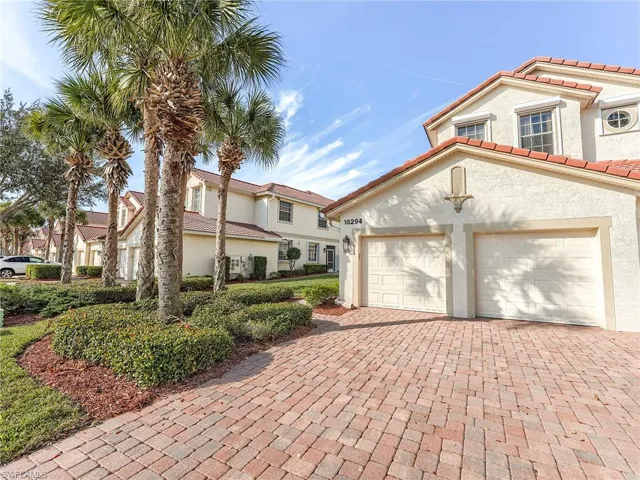 2-car attached garage & paver stone driveway