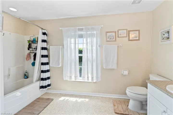 Office space with baseboards and a sink