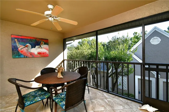 Sunroom / solarium featuring a wealth of natural light and ceiling fan