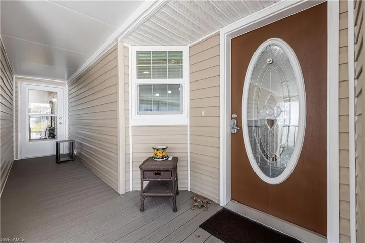 Property entrance with a deck