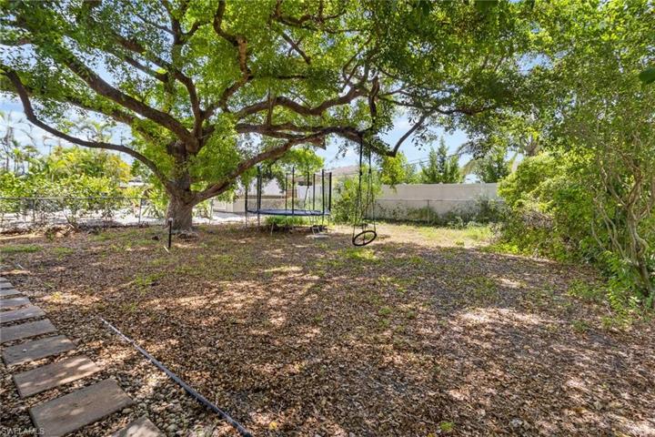 Plenty of room for a pool in the fenced backyard
