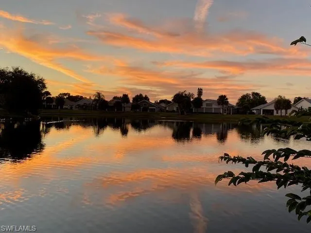 Water view with nearby suburban area