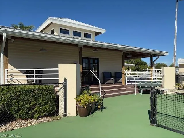 Game room building and tennis court area