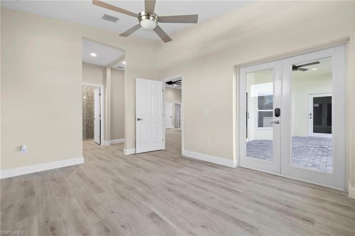 Master Bedroom #1 with ensuite bathroom & French Door to Lanai