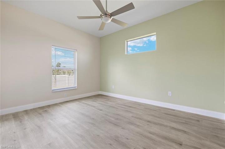 Master Bedroom #1 with ensuite bathroom & French Door to Lanai