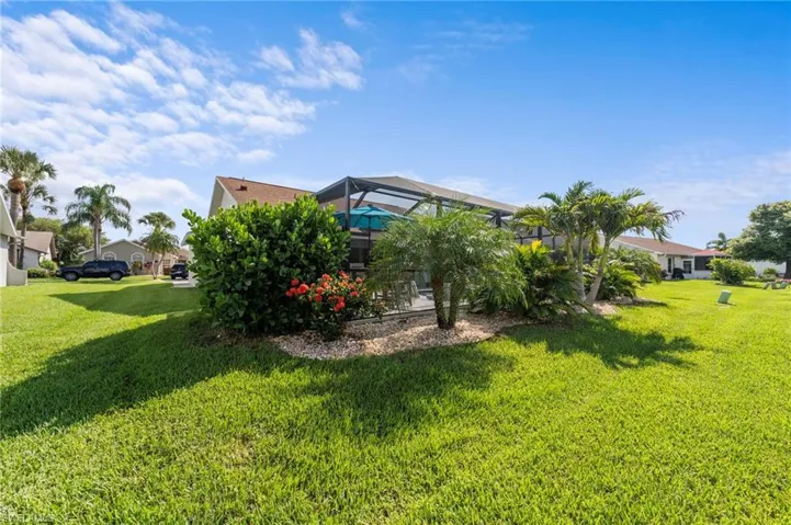 Tropical landscaping for privacy and lush view from inside the pool area