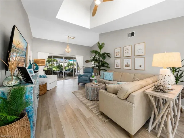 Vaulted ceilings with skylight and wood-finish flooring